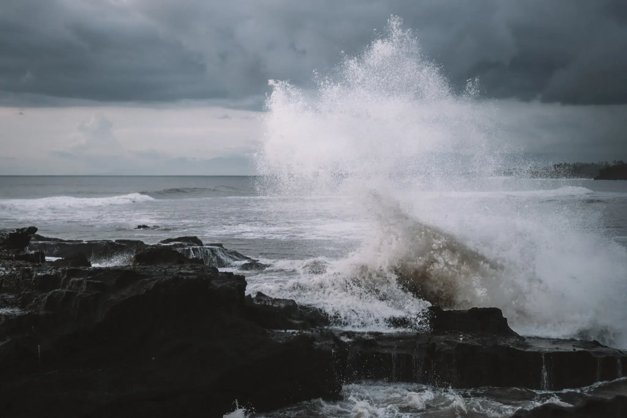 Volatile markets represented by waves crashing